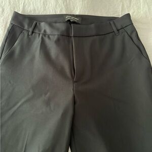 Brand new dress pants. Worn once. Size 4 but fits like a 6. Black.